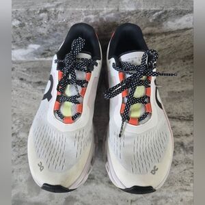 On Running Athletic Shoes in White and Orange